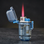 Glacier Lighter open flip-top lid and torch flame