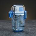 Glacier Lighter transparent blue front view on charcoal stone